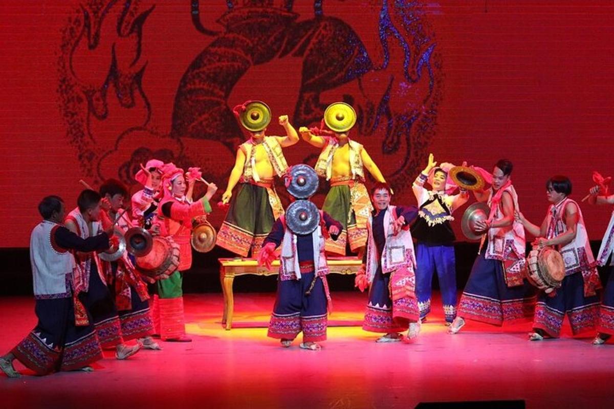 a group of people standing on a stage with instruments