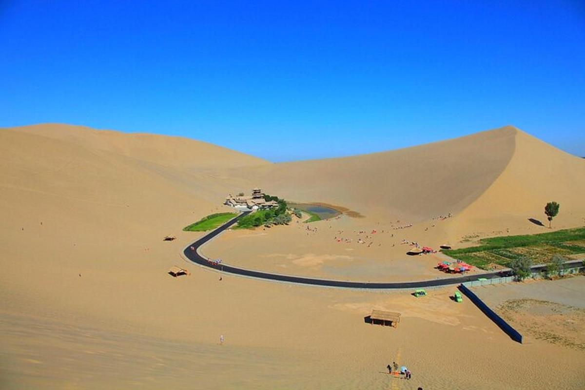 a winding road in the middle of a desert