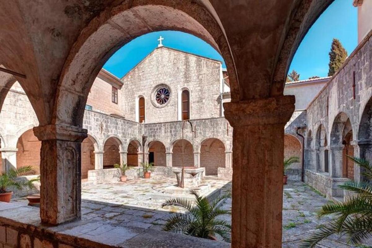 an archway of a building with a church