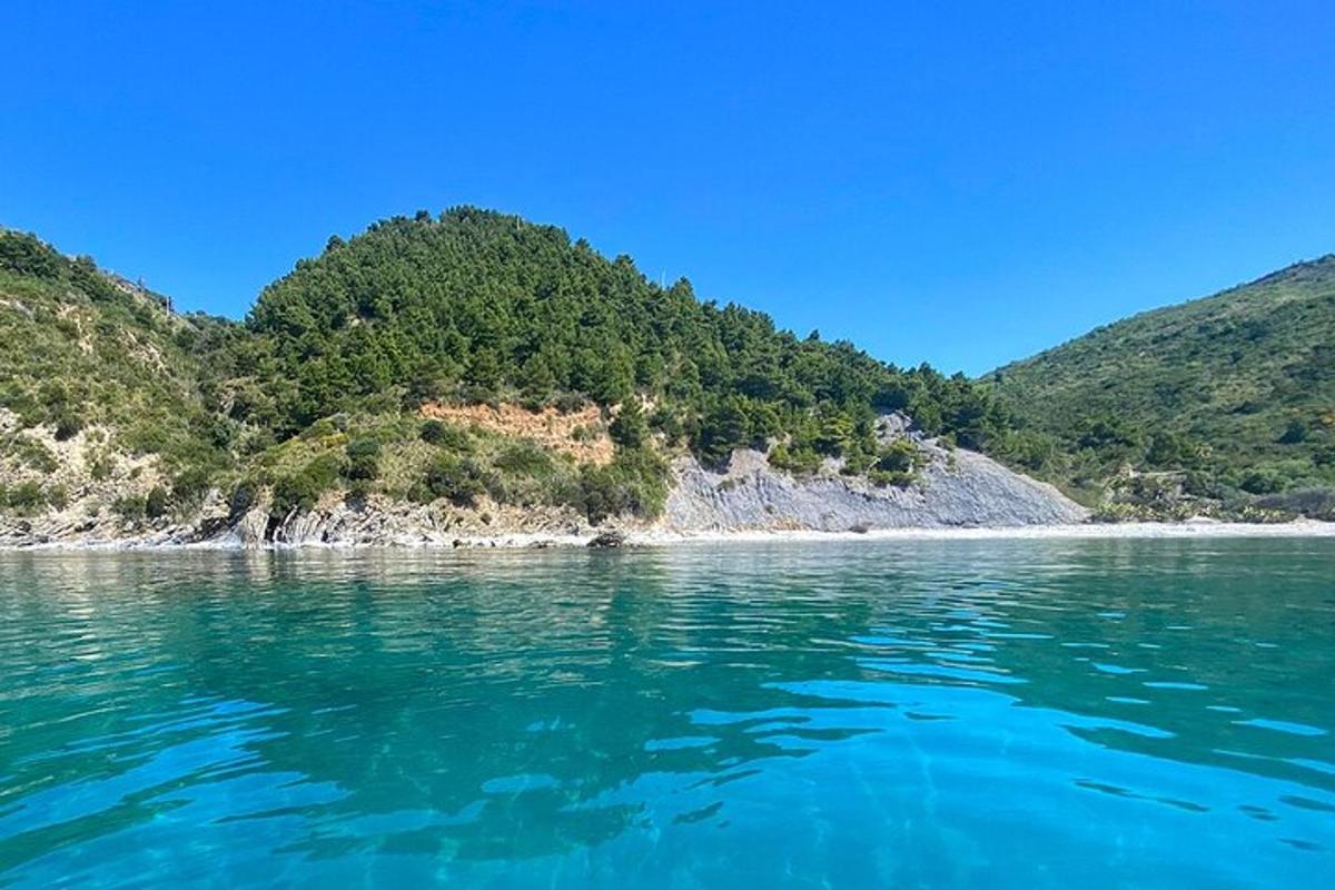a view of a body of water with mountains