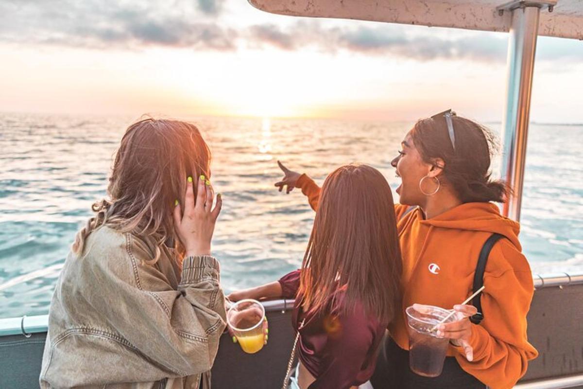 a group of three women standing on a boat