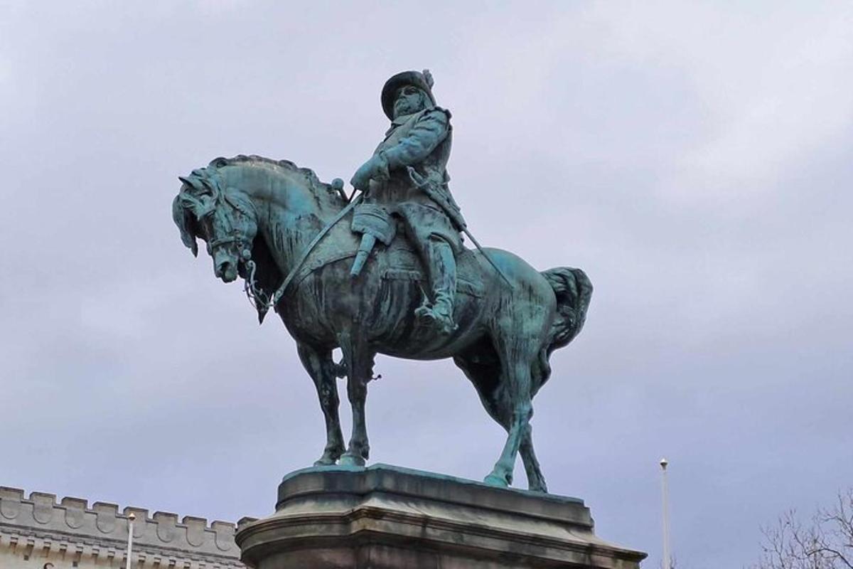 a statue of a man riding a horse