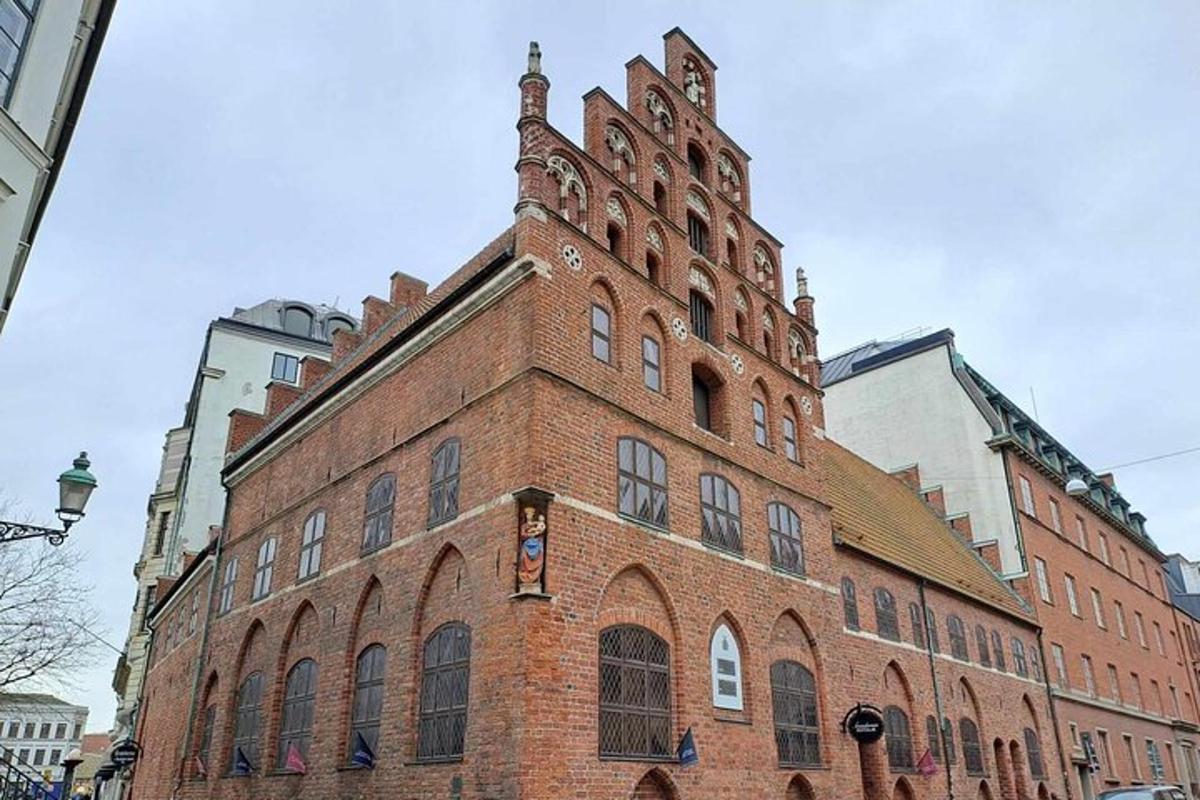a large brick building with a tower on top of it