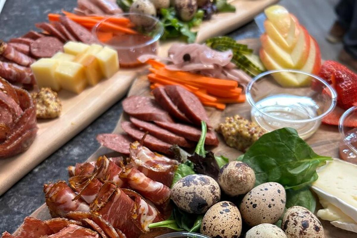 a table topped with different types of meats and vegetables