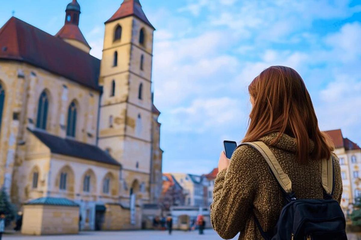 a woman with a backpack standing in front of a church