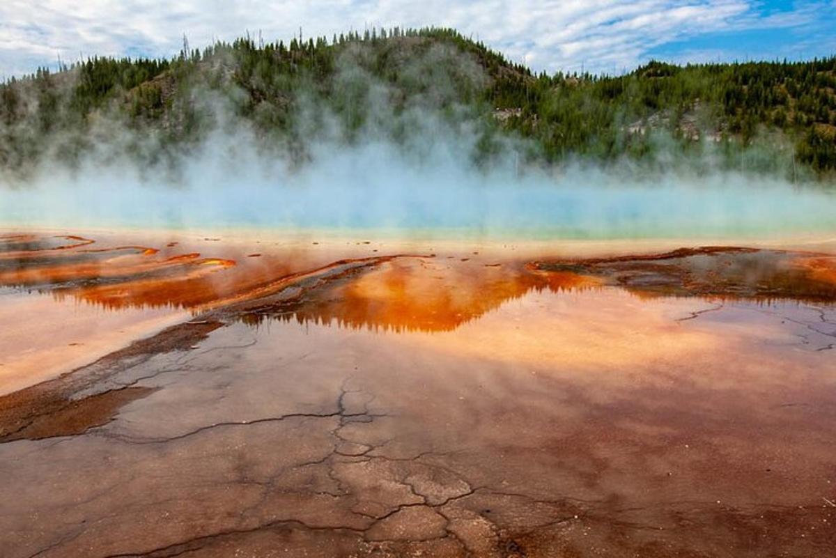 a body of water with a bunch of steam