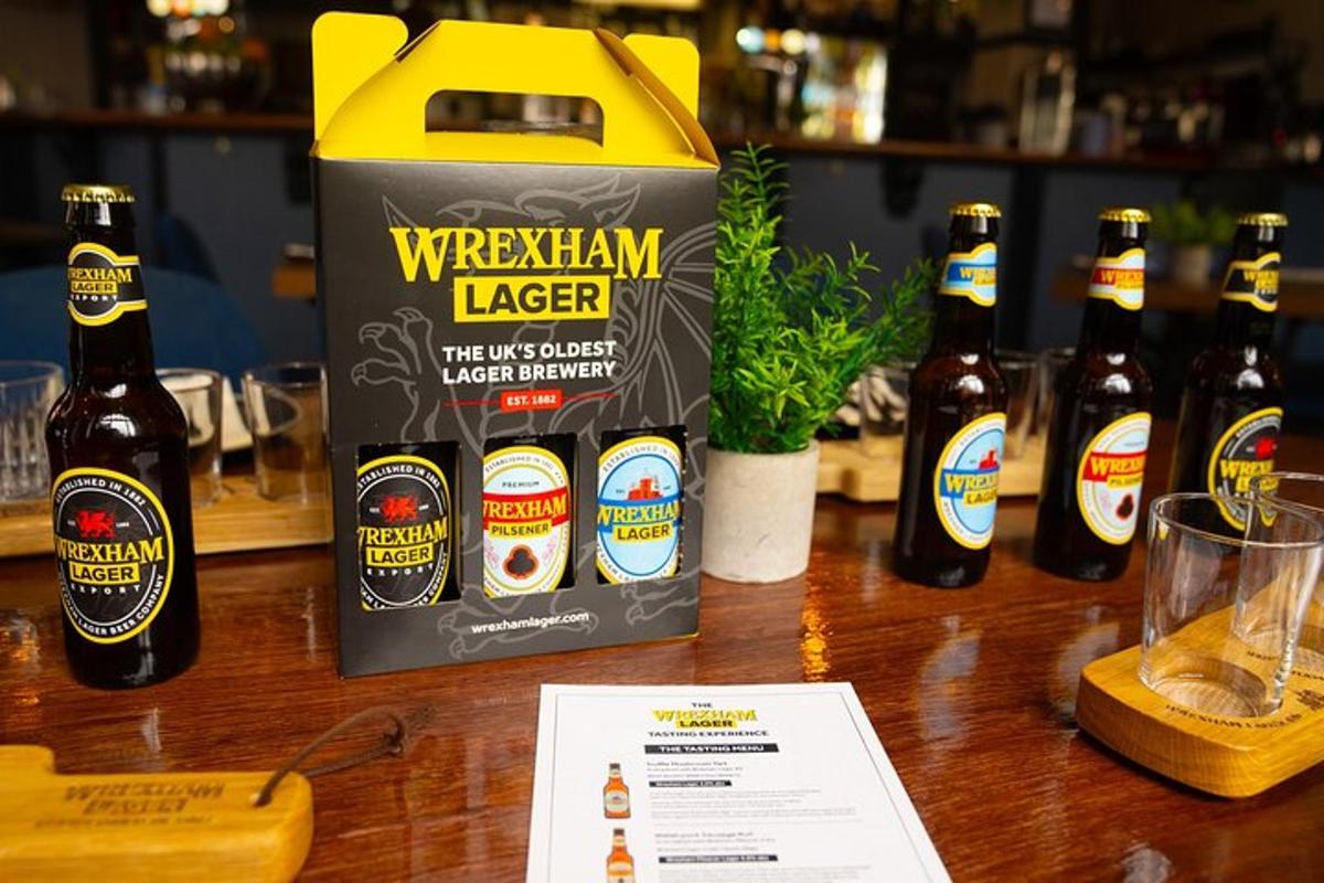 a group of bottles of beer sitting on a table