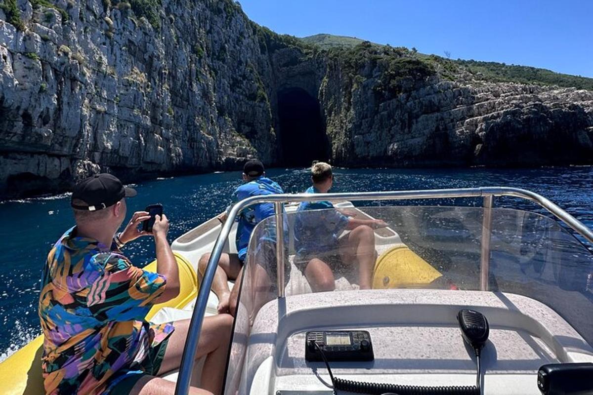 a group of people on a boat in the water