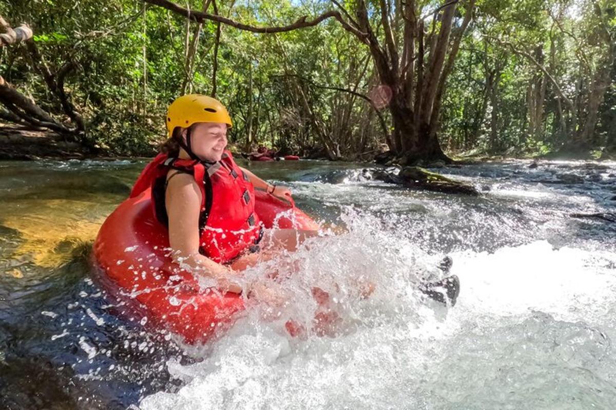a young girl in a raft in a river