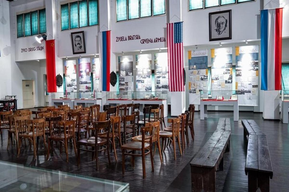 a restaurant with chairs and tables in a building
