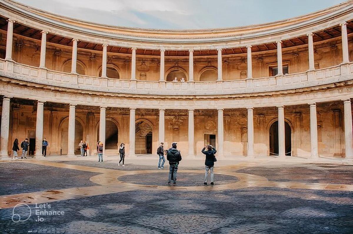 a group of people standing inside of a building