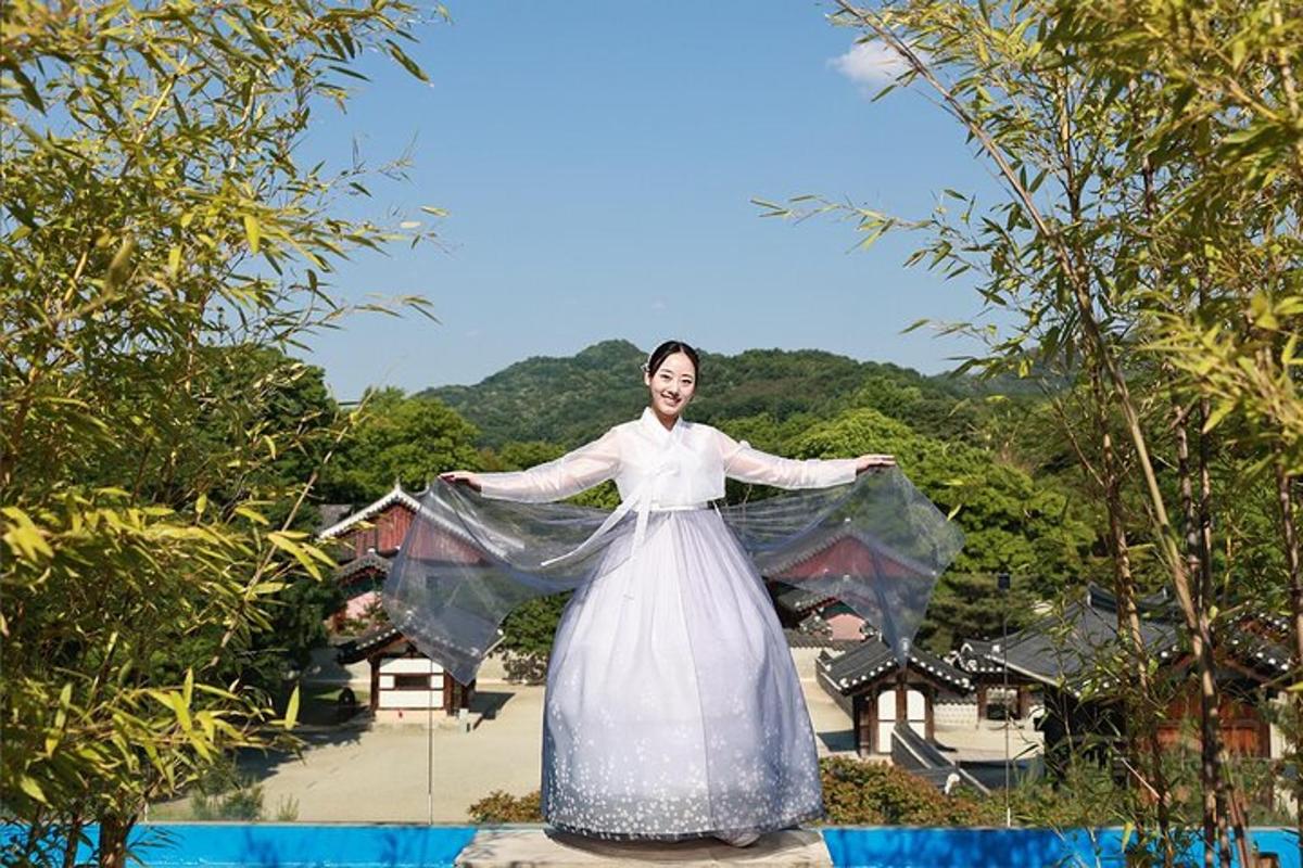 a woman in a dress with her arms out