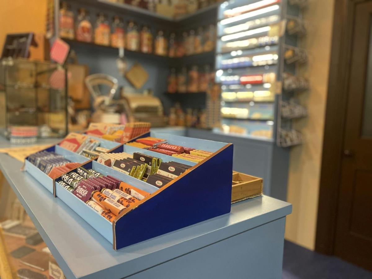 two boxes of food sitting on a counter in a store