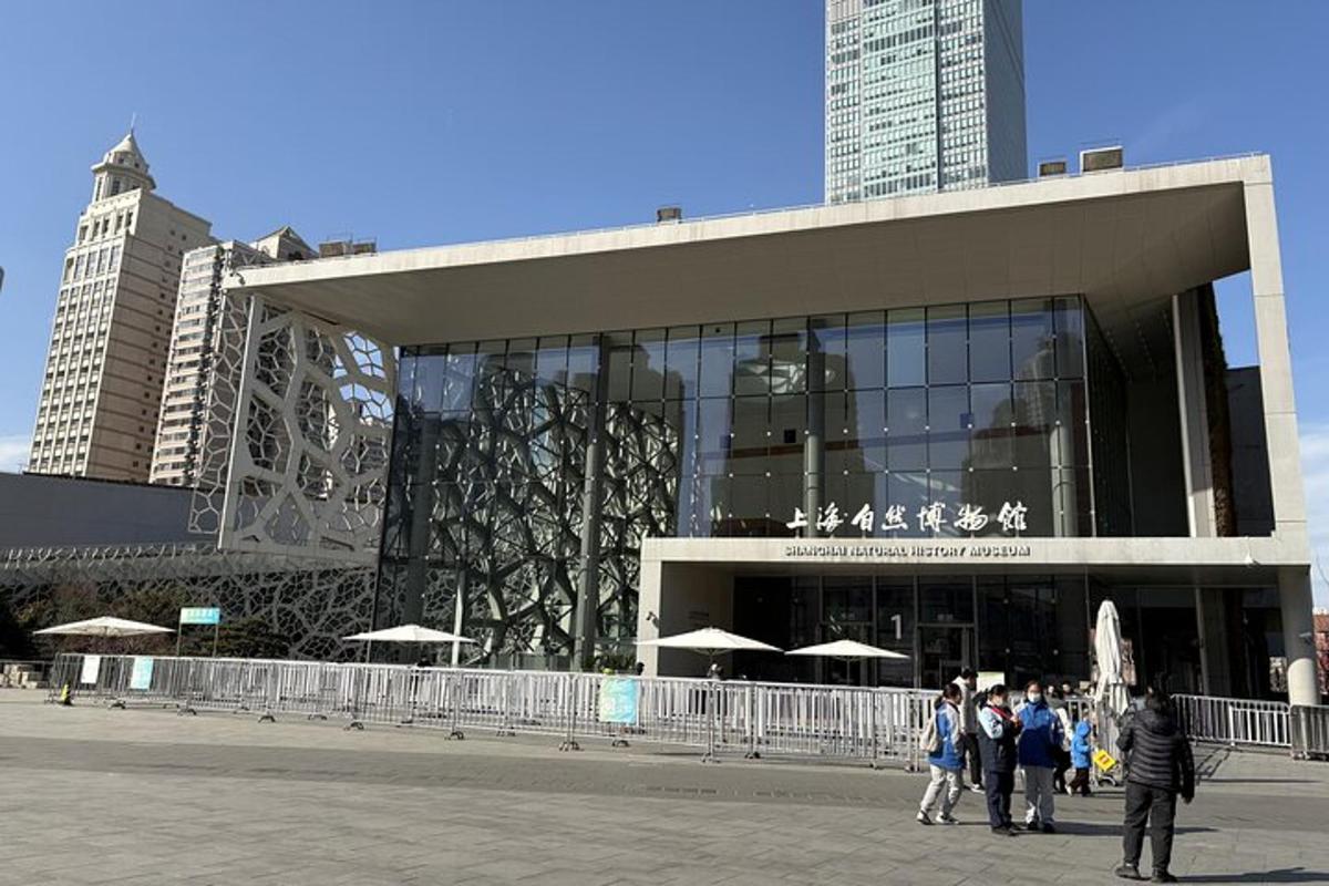 a group of people standing in front of a building
