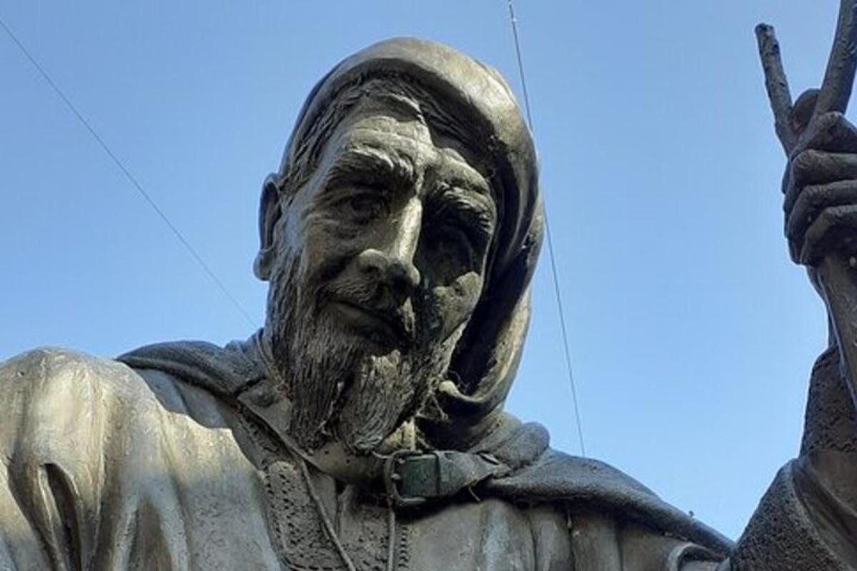 a statue of a man wearing a helmet