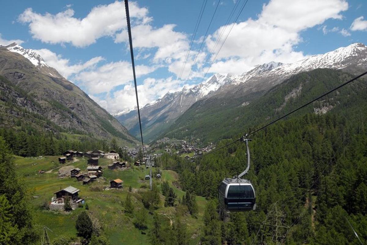 a gondola ride over a valley in the mountains