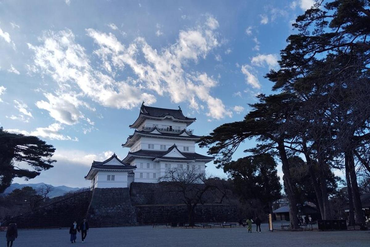 a large white building with a castle