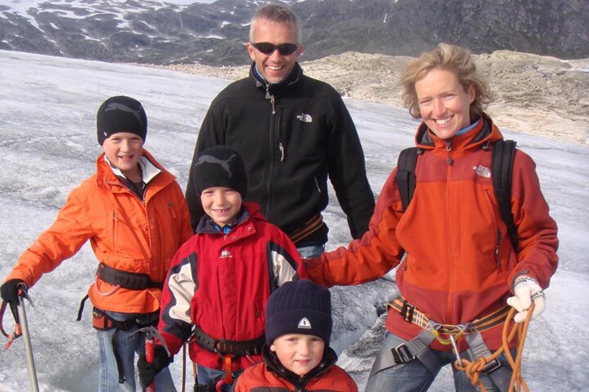 a group of people standing on the ice