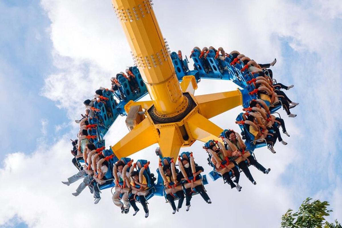 a group of people riding on a roller coaster
