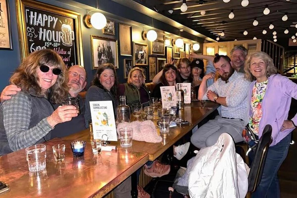 a group of people sitting at a table in a restaurant