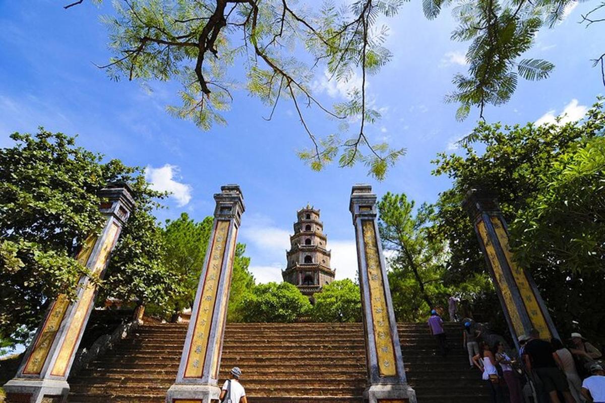 a stairway leading up to a building with a tower