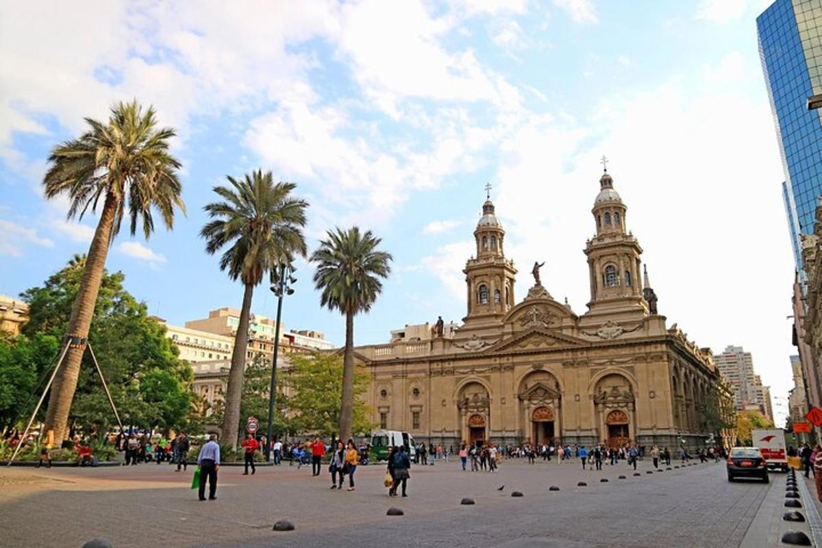 a large building with palm trees in front of it