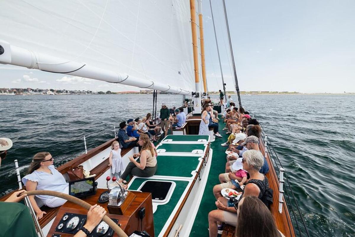 a group of people on a boat in the water