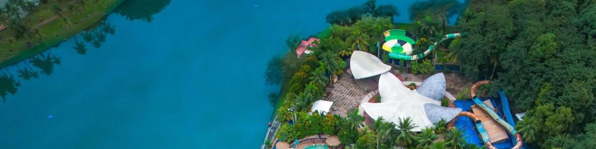 an aerial view of a water park with a water slide