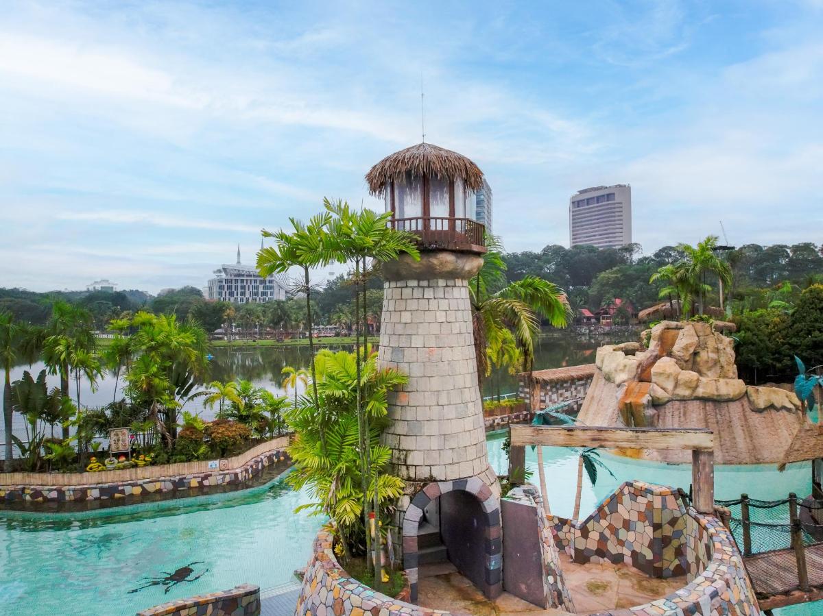 a water park with a tower in the water