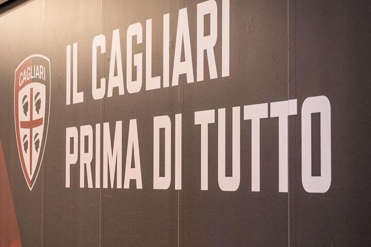 a sign for a pizza institution on a wall