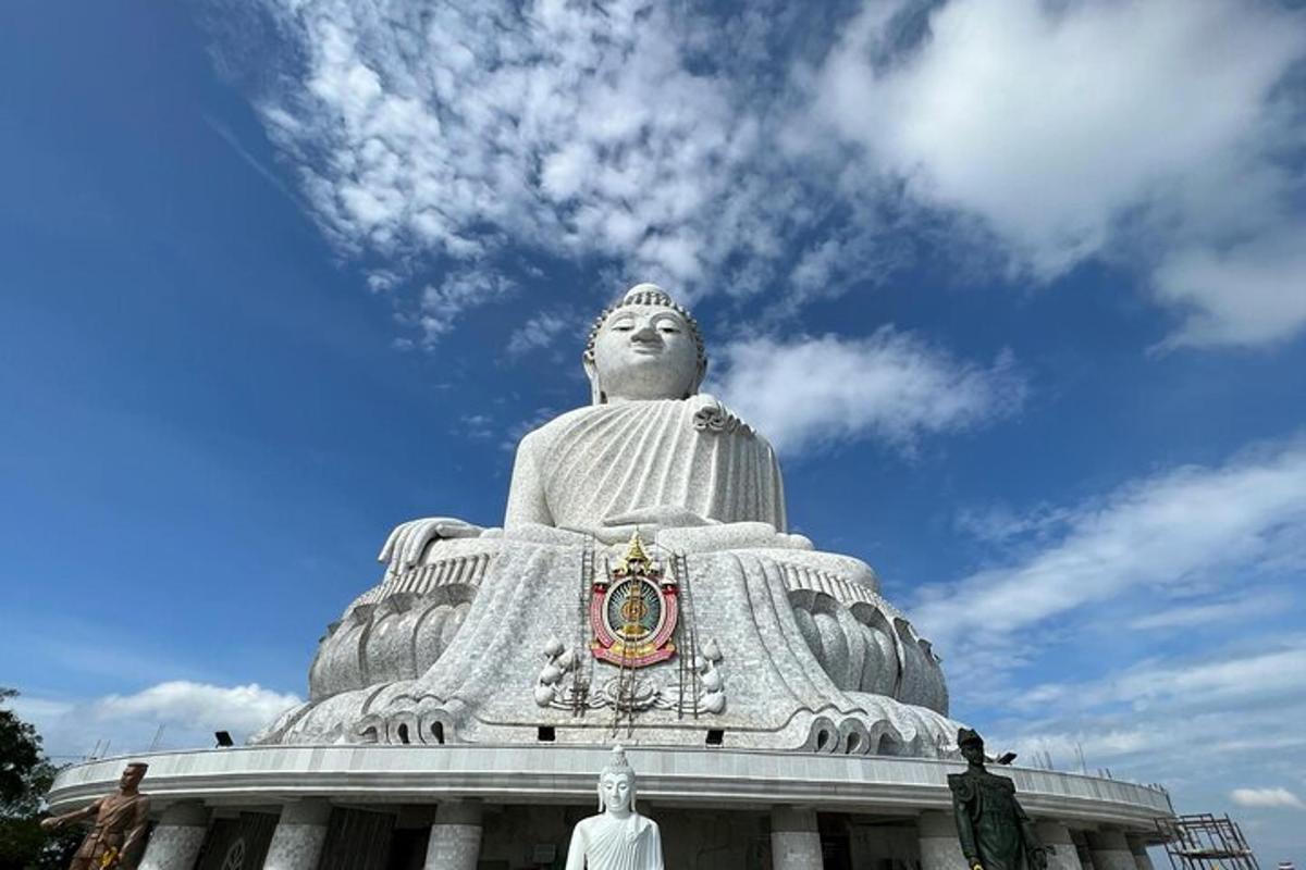 a large statue on the top of a building