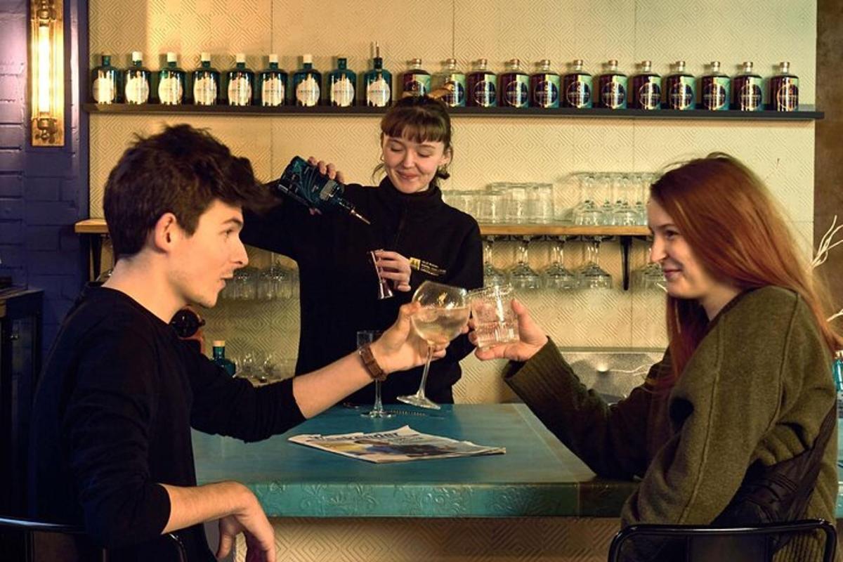 a group of people sitting at a table with wine glasses