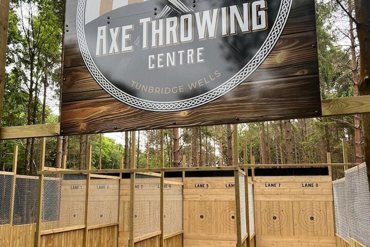 a sign for the entrance to a tree throwing centre