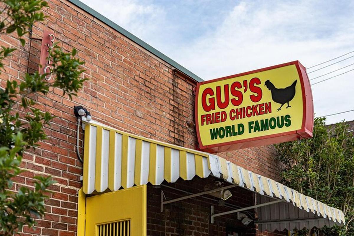 a sign for a red chicken world famous restaurant