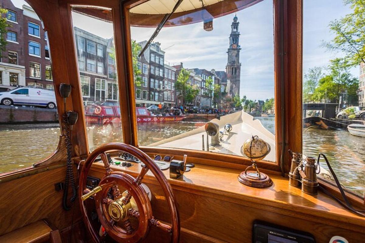 a boat in a canal with a view of a city