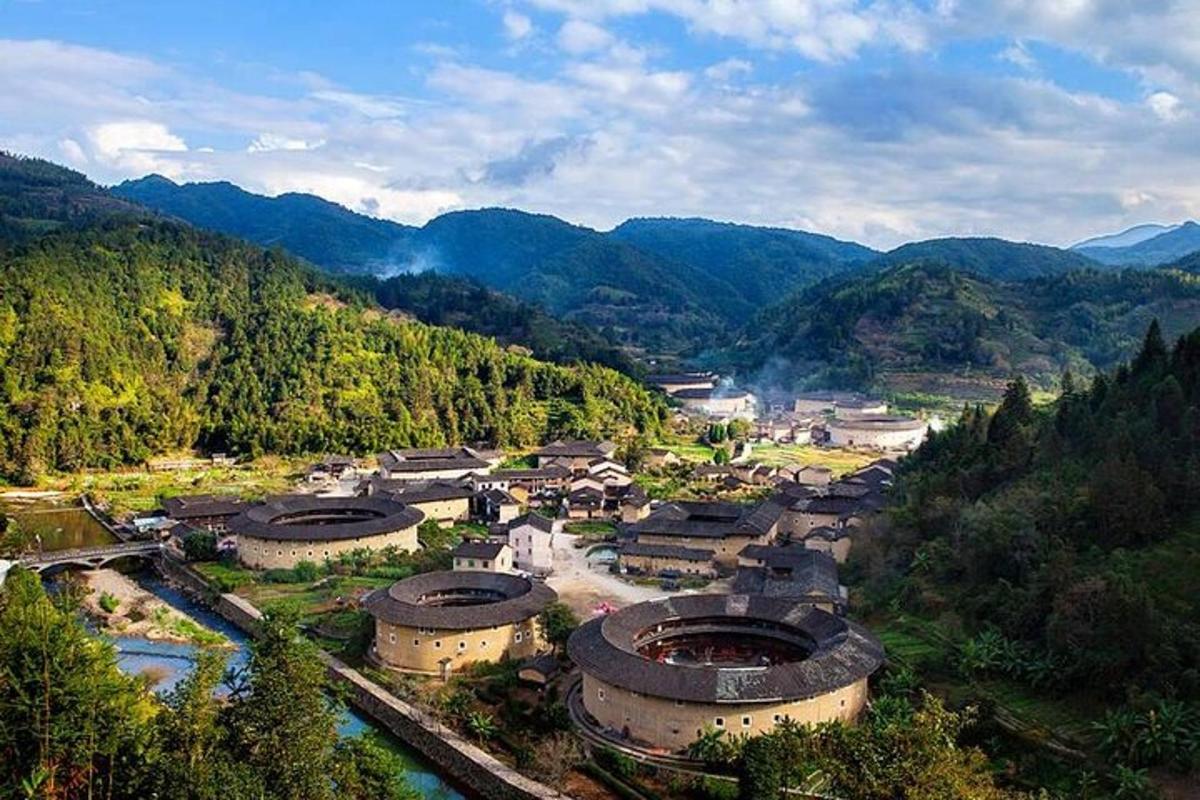 an aerial view of a village in the mountains