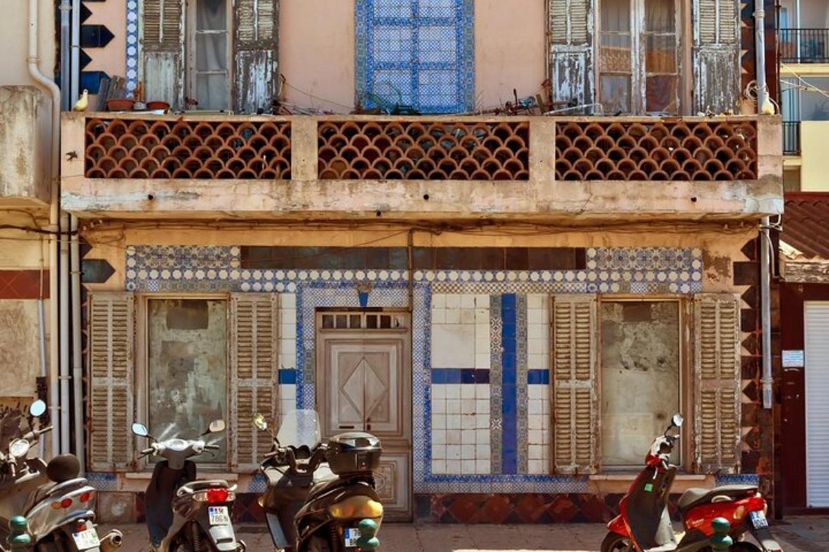 a group of motorcycles parked in front of a building