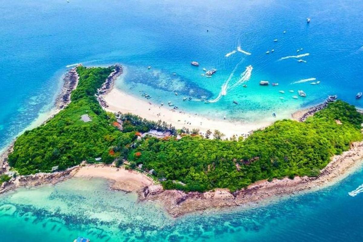 an island in the ocean with people on it