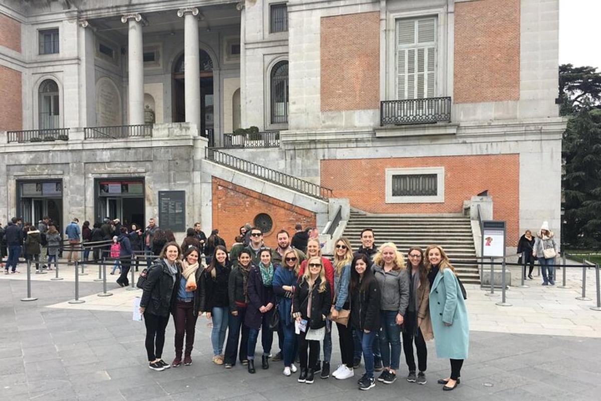 a group of people standing in front of a building
