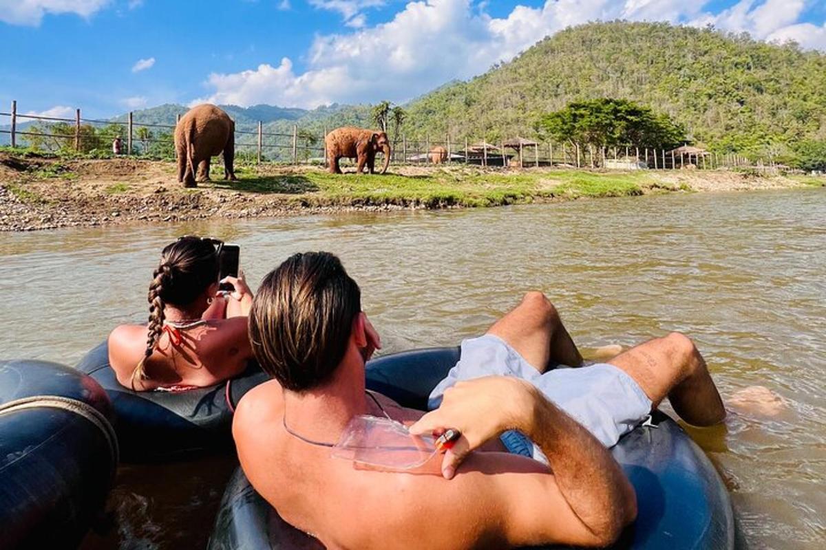 two people are riding on anlatable raft in the water