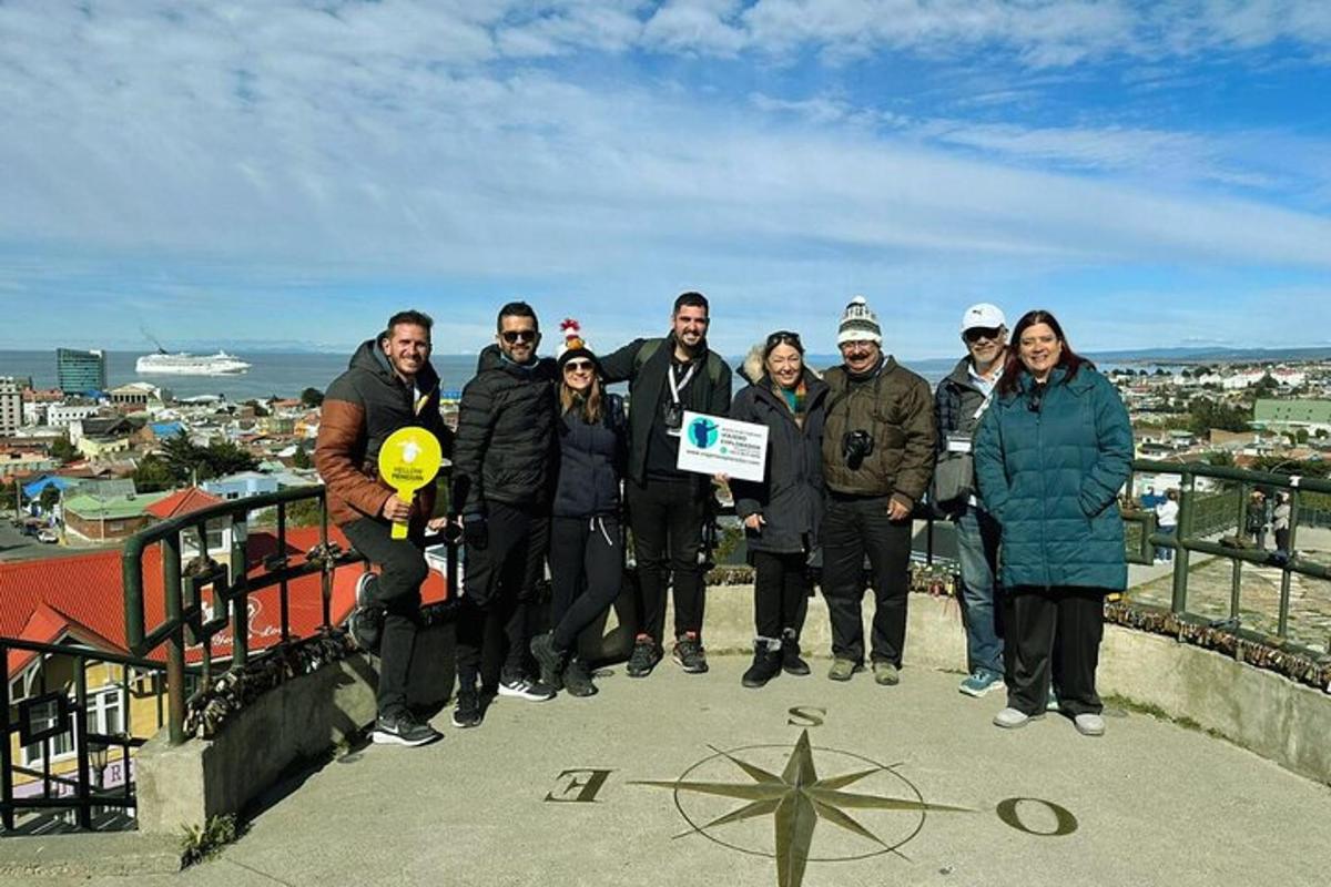 a group of people standing on the top of a tower