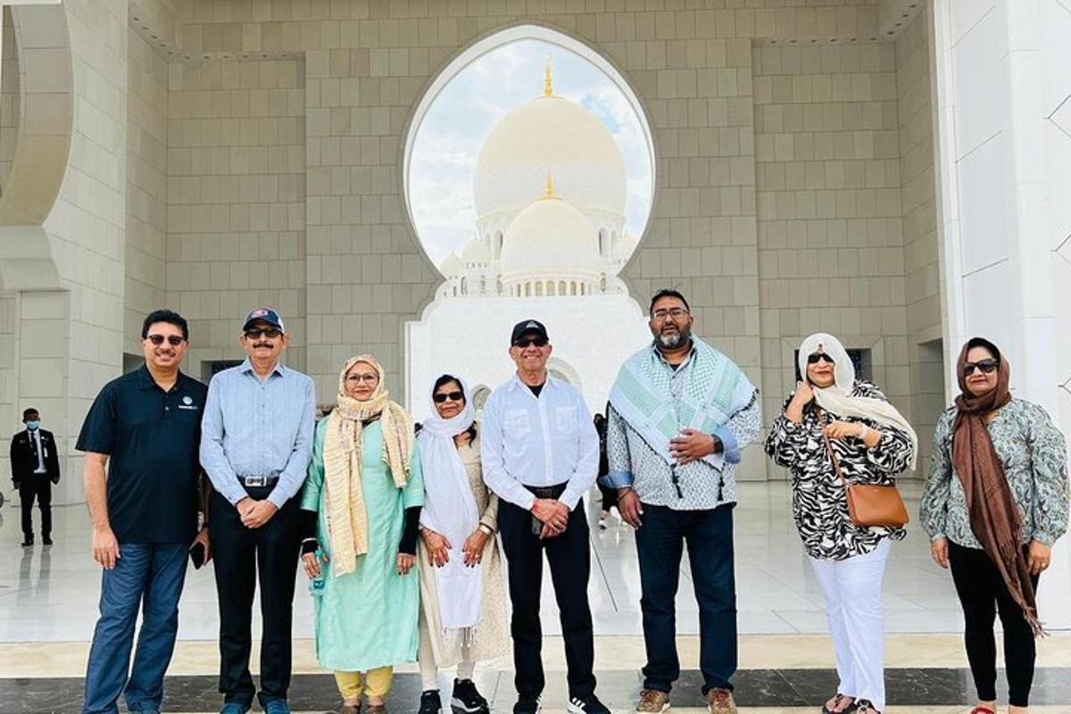 a group of people standing in front of a building
