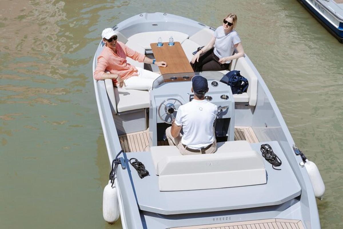 a group of people on a boat in the water