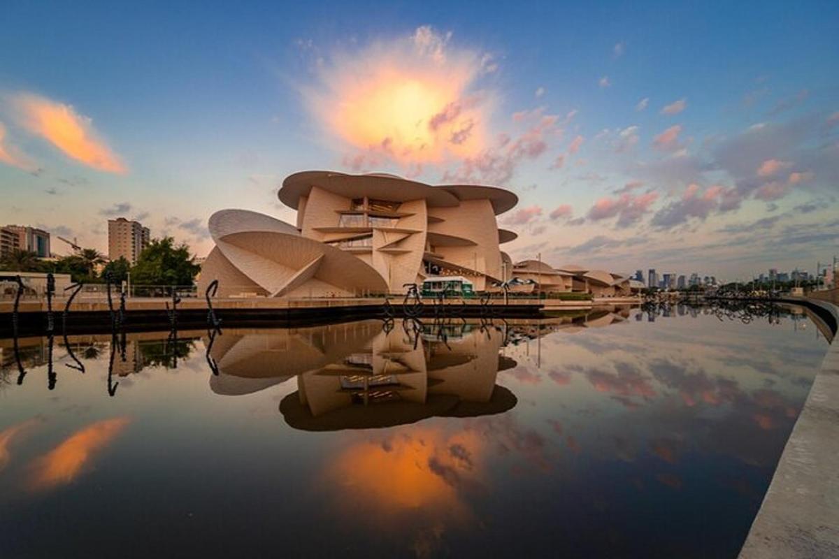 a building with its reflection in a body of water