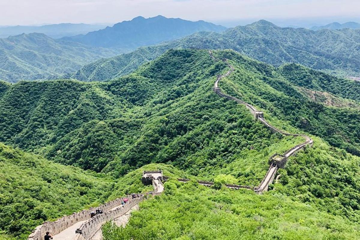 a group of people standing on the great wall