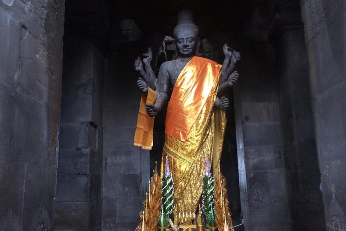 a statue of a man standing in a building