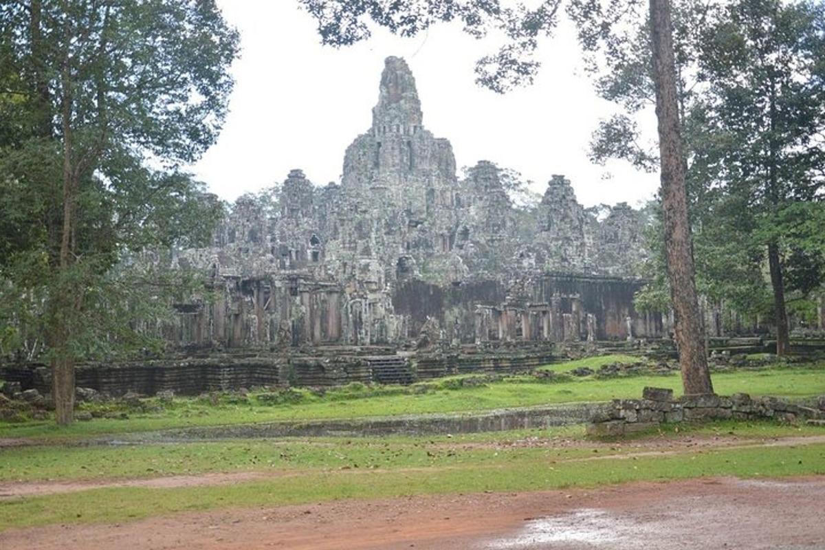 a view of a temple in a park with trees