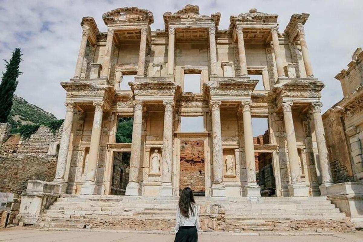 a woman standing in front of a building