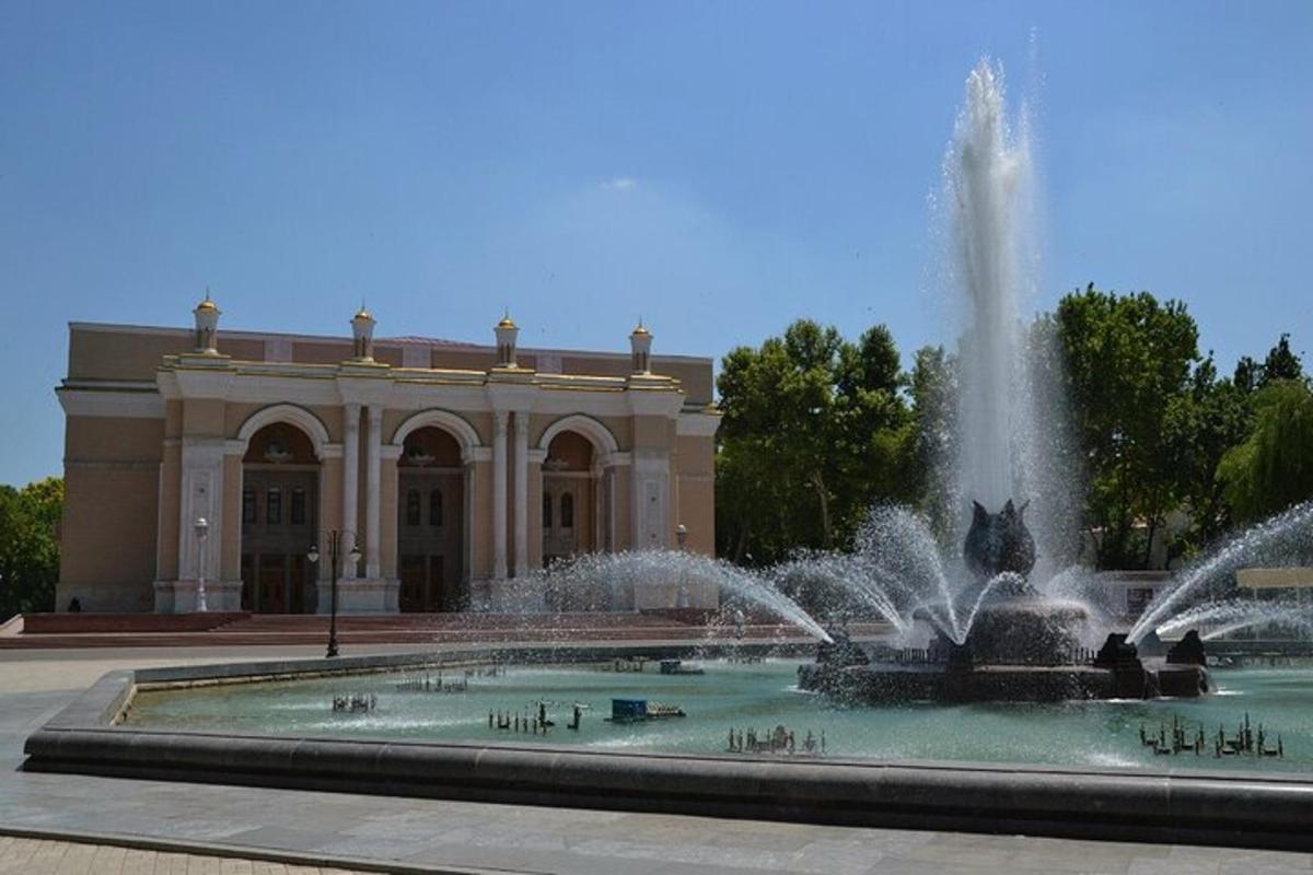 a water fountain in front of a building