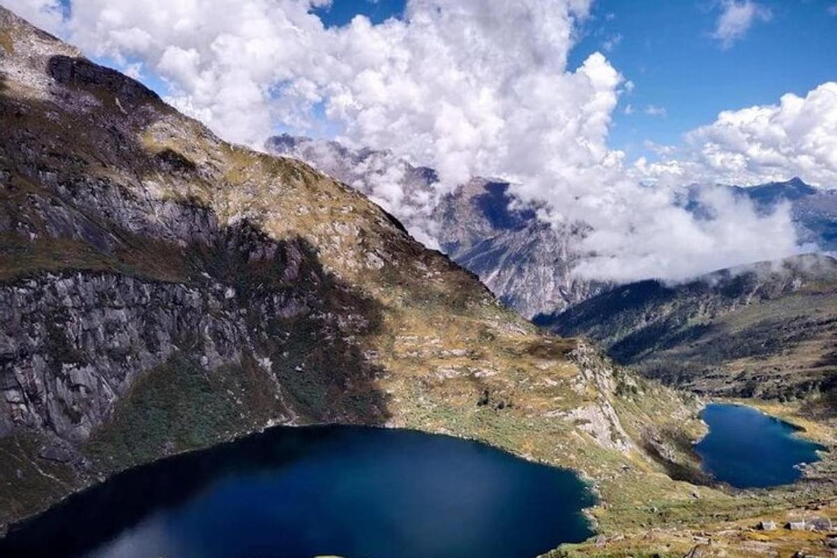 a view of a mountain with a large blue lake